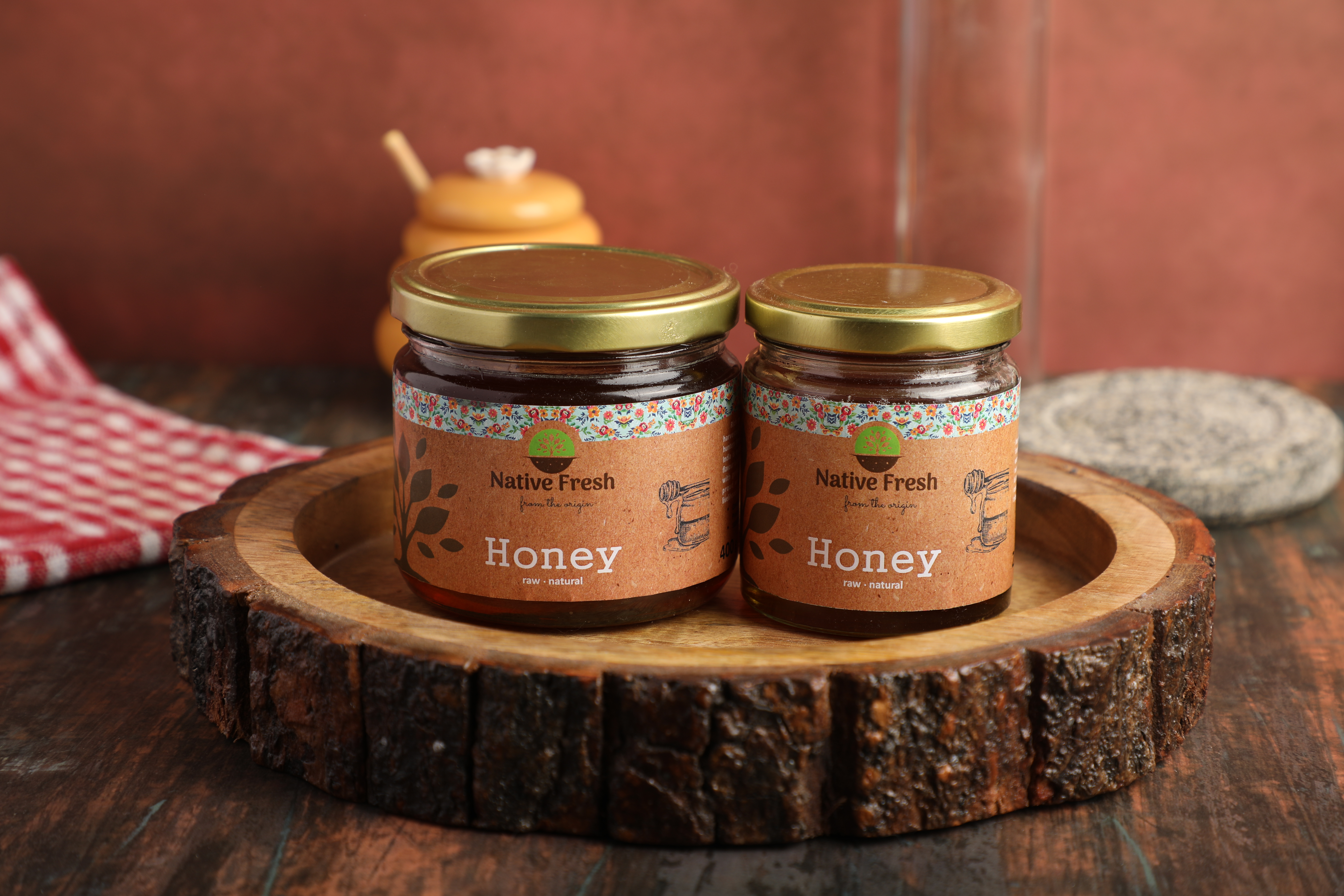 Raw organic honey in glass jar